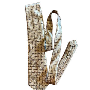 Lovely silk 3.5” wide patterned creamy light gold with browns and whites